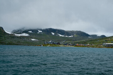 lake landscape with snowcapped mounutains in background