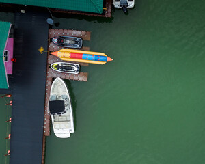 Fototapeta na wymiar Aerial top view of water transport parked in Kenyir Lake, Terengganu, Malaysia.