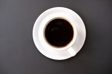 cup of coffee on wooden table