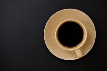 cup of coffee on black