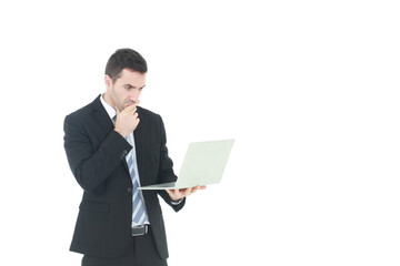 Successful and handsome  businessman in a suit smiling with hand holding notebook. He serious in working on a laptop isolated on white background. Copy space