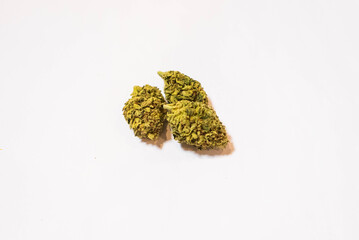 Marijuana nugs, bright green cannabis flower trimmed and dried for smoking