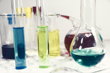 Laboratory chemical liquid elements and research diagnoses, instruments and objects in the sterile table, glassware