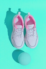 Minimal still life design. Fashion sport shoes concept. Pastel trends. Stylish white sneakers