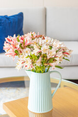 Astromeliads flower arrangement in a nice living room