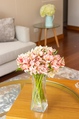 Astromeliads flower arrangement in a nice living room