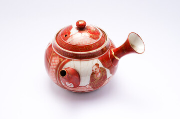 Kintsugi Japanese teapot isolated on white background. 
