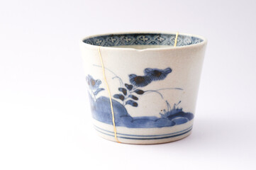 Antique Japanese kintsugi soba cup restored with gold. Antique Kintsukuroi ceramic. 