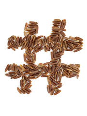 Sign of a grid of brown rice grains on an isolated white background.