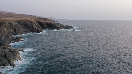 mighty ocean spitting out the cliffs