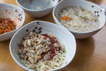 Korean food seafood noodle Soup with clams.