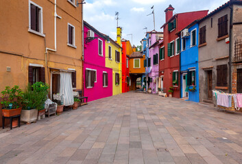 Facades of traditional old houses on the island Burano.