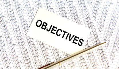 Obraz premium Paper with text objective on wood table