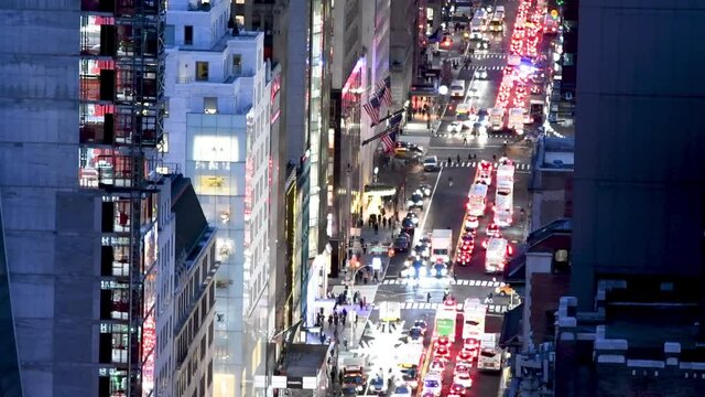 NEW YORK CITY - DECEMBER 2018: Slow motion aerial overhead view of Manhattan night traffic in slow motion, New York City, USA