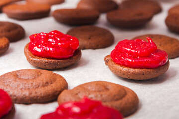 cooking homemade red gem on brown biscuit