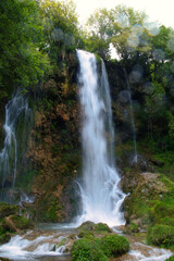 Gostilije waterfall falling from rock in Zlatibor resort of Western Serbia