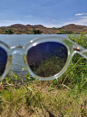glasses on the beach