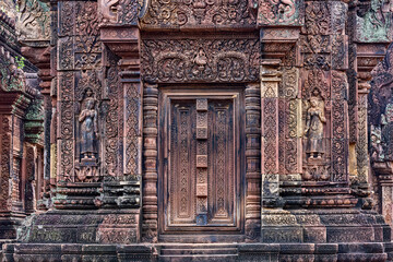 Fototapeta na wymiar Blind door and balusters Banteay Srei temple in Angkor, Siem Reap, Cambodia