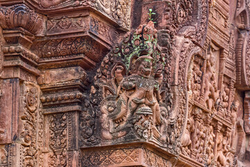 Stone carvings and naga sculpture at Banteay Srei temple at Angkor in Siem Reap, Cambodia