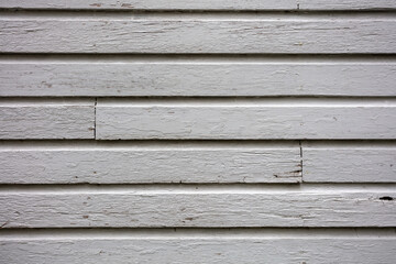 Old weathered white wooden wall