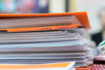 File document orange binders for accountant audit in bookkeeping business office. Archive auditing or financial in corporate concept