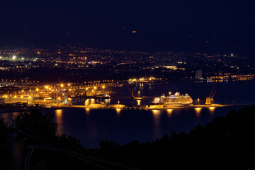 Fototapeta na wymiar Night panorama on the port of Marina di Carrara Tuscany Italy from Montemarcello
