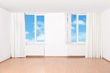 Fototapeta na wymiar Beautiful view on blue sky with clouds through windows in room