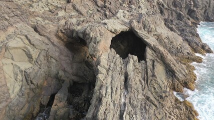 mighty ocean spitting out the cliffs