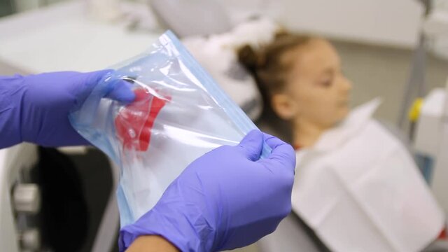 Unpacking of a disposable inhalation mask for children