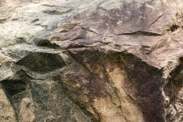 The surface of the cliff with various colors.