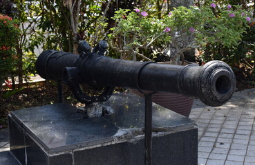Fototapeta na wymiar Old traditional black cannon in Malaysia