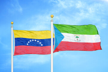 Naklejka na ściany i meble Venezuela and Equatorial Guinea two flags on flagpoles and blue sky