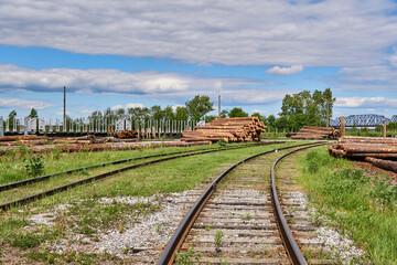 Fototapeta na wymiar rails in the cargo yard of the woodworking industry
