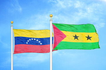 Venezuela and Sao Tome and Principe two flags on flagpoles and blue sky