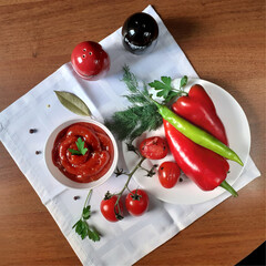 top view of vegetables and ketchup made from them, om the table.