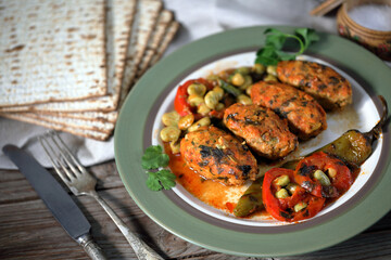 Fish meatballs in tomato sauce. Meatballs with a side dish of green beans and vegetables in tomato sauce 
close-up in a plate on the table. horizontal
