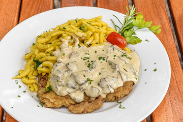 schnitzel with mushroom cream and spaetzle