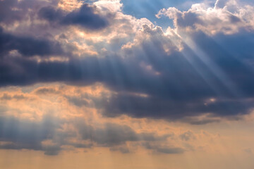 Naklejka na ściany i meble Shafts of light pierce the clouds above Morston Quay, Norfolk, UK