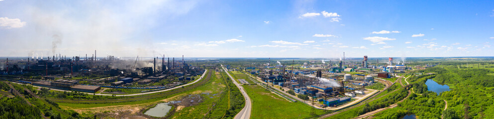 panorama of blast furnaces and other elements of the black metallurgical industries and the chemical industry in Cherepovets, a view of the structure from a height.