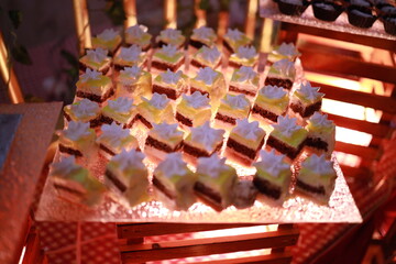 Indian reception wedding cake with roses and donuts.Beautiful wedding cake in Romantic styles.