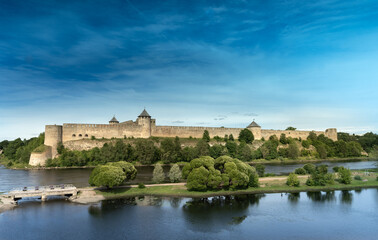 Fototapeta na wymiar Ivamgorod Castle on the Russion bank of the Narva River at the border between Estonia nd Russia.