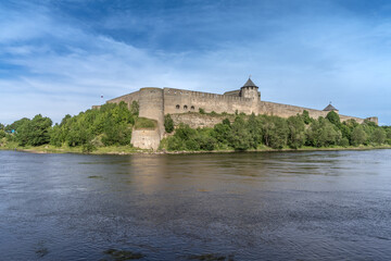 Fototapeta na wymiar Ivamgorod Castle on the Russion bank of the Narva River at the border between Estonia nd Russia.