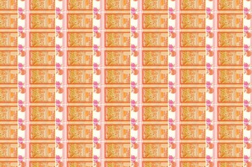 100 Sri Lankan rupees bills printed in money production conveyor. Collage of many bills. Concept of...
