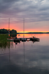 Dramatic sunset at lake in Slawa, Western Poland - obrazy, fototapety, plakaty