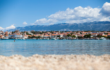 Fototapeta premium Panoramic view of the city from the beach,Island Pag,Croatia