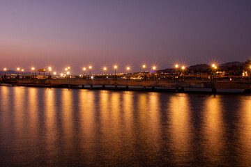 Fototapeta na wymiar Sunset over sea, Sunset over pier, long exposure for sunset 