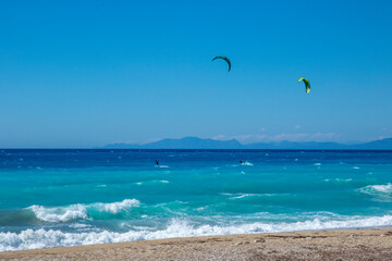 Agios Ioannis Beach In Lefkas Island Greece with two kite surfers