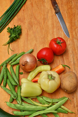 fresh vegetables on wooden surface 