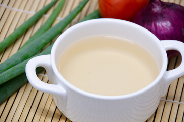 Vegetable broth in a ceramic bowl
