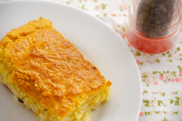 Vegetables savory pie piece on a plate. 